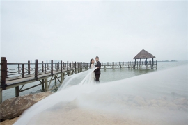 Photoshop打造霞光中的大气海景婚片