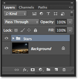 The Layers panel showing the new Stars layer group. Image © 2013 Photoshop Essentials.com