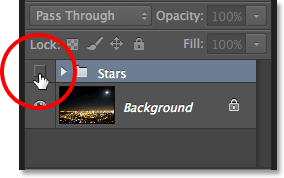 Clicking the Stars layer group's visibility icon. Image © 2013 Photoshop Essentials.com