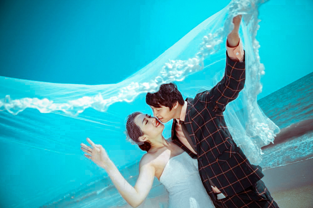 PhotoShop调出清新的海景婚纱照影楼调色后期教程 
